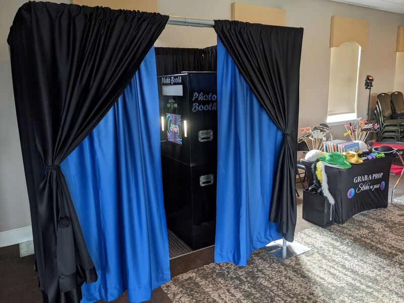 vintage enclosed photo booth with curtains