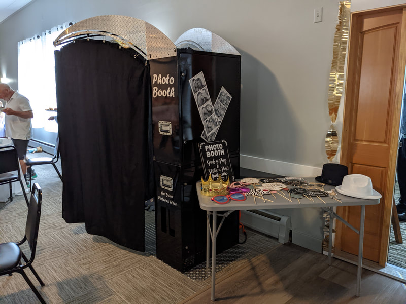 photo booth at wedding with props